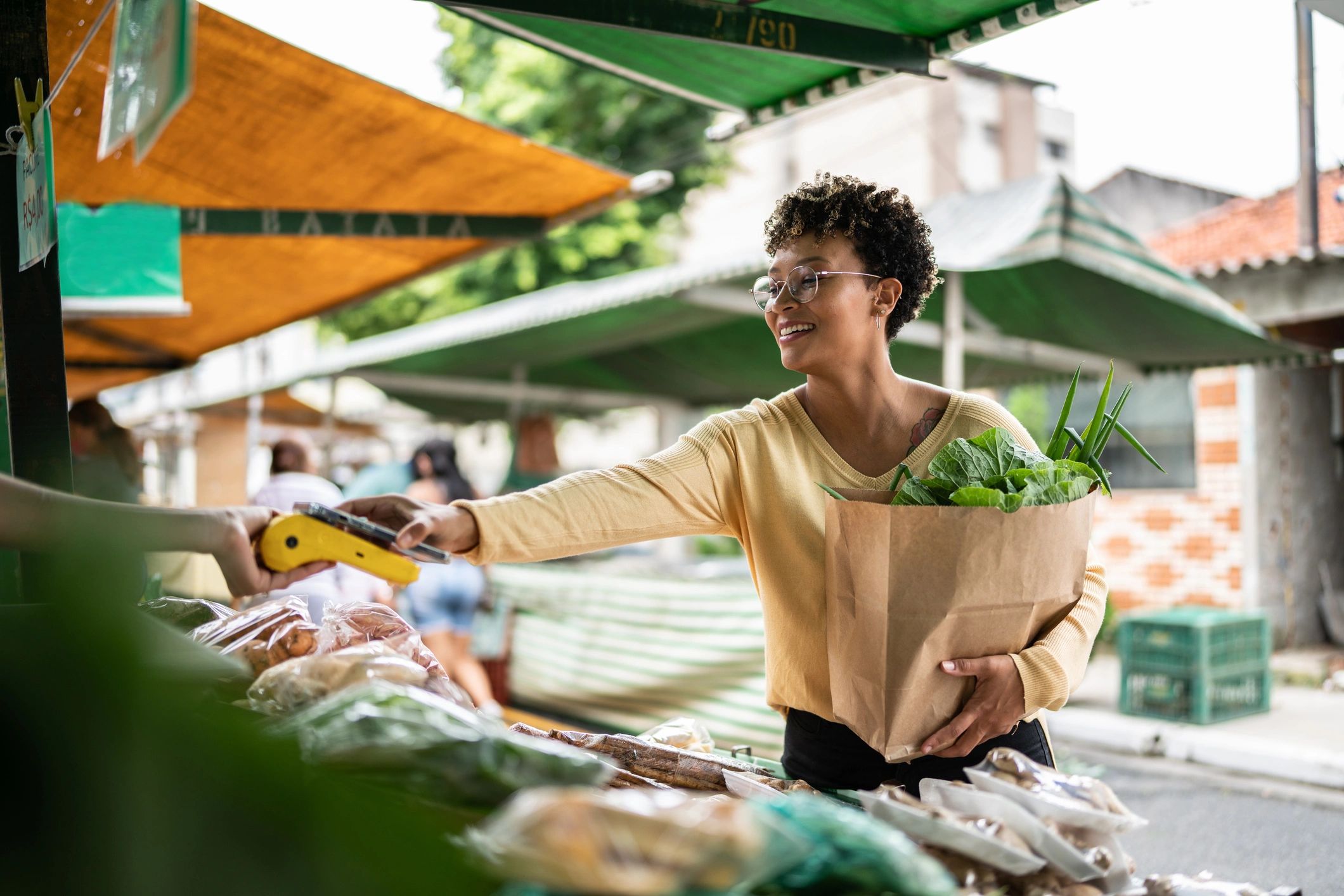 Customer making a mobile payment while shopping